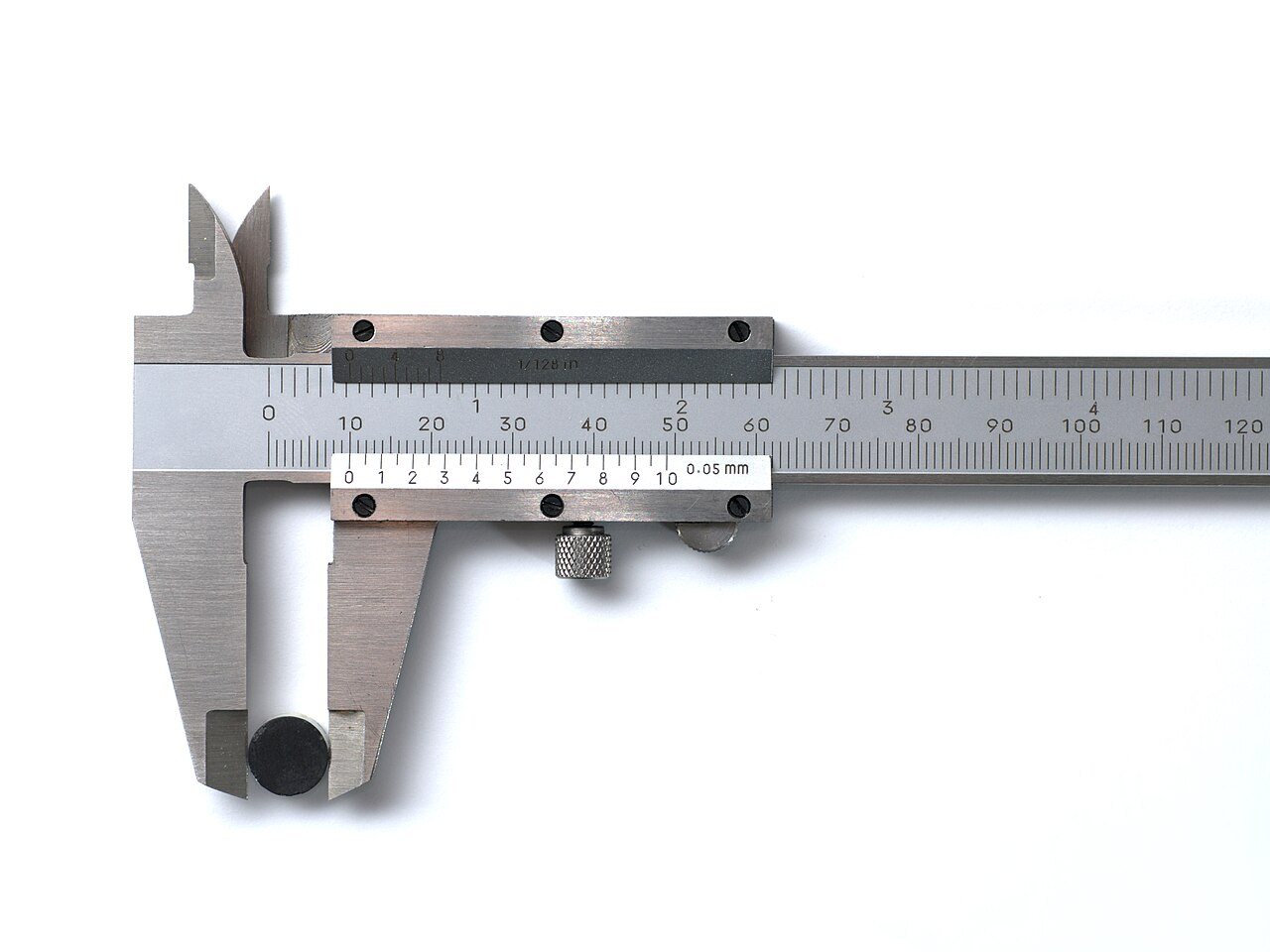 A vernier caliper measuring a part against a white background